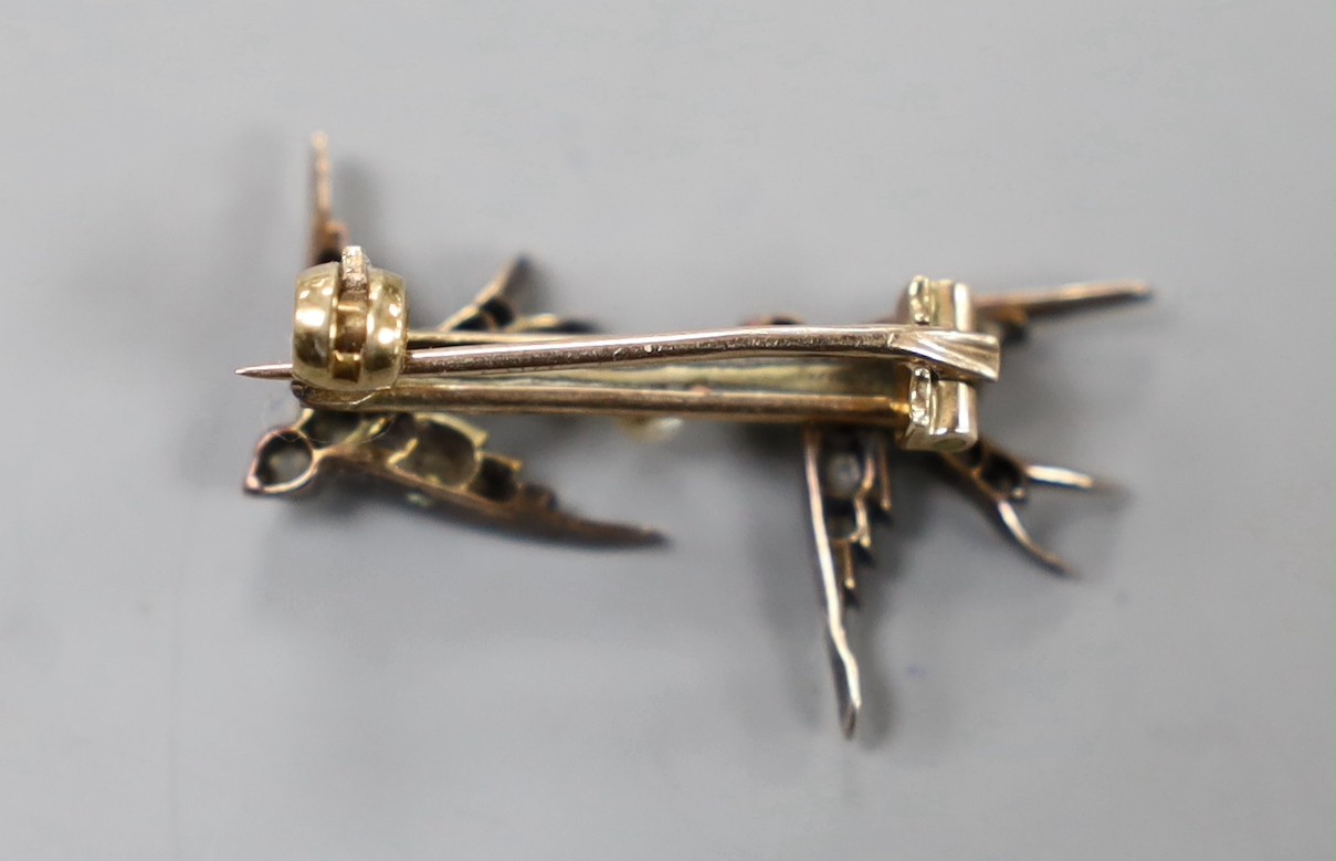A late Victorian yellow and white metal and rose cut diamond set twin swallow brooch, 27mm, gross weight 2.8 grams.